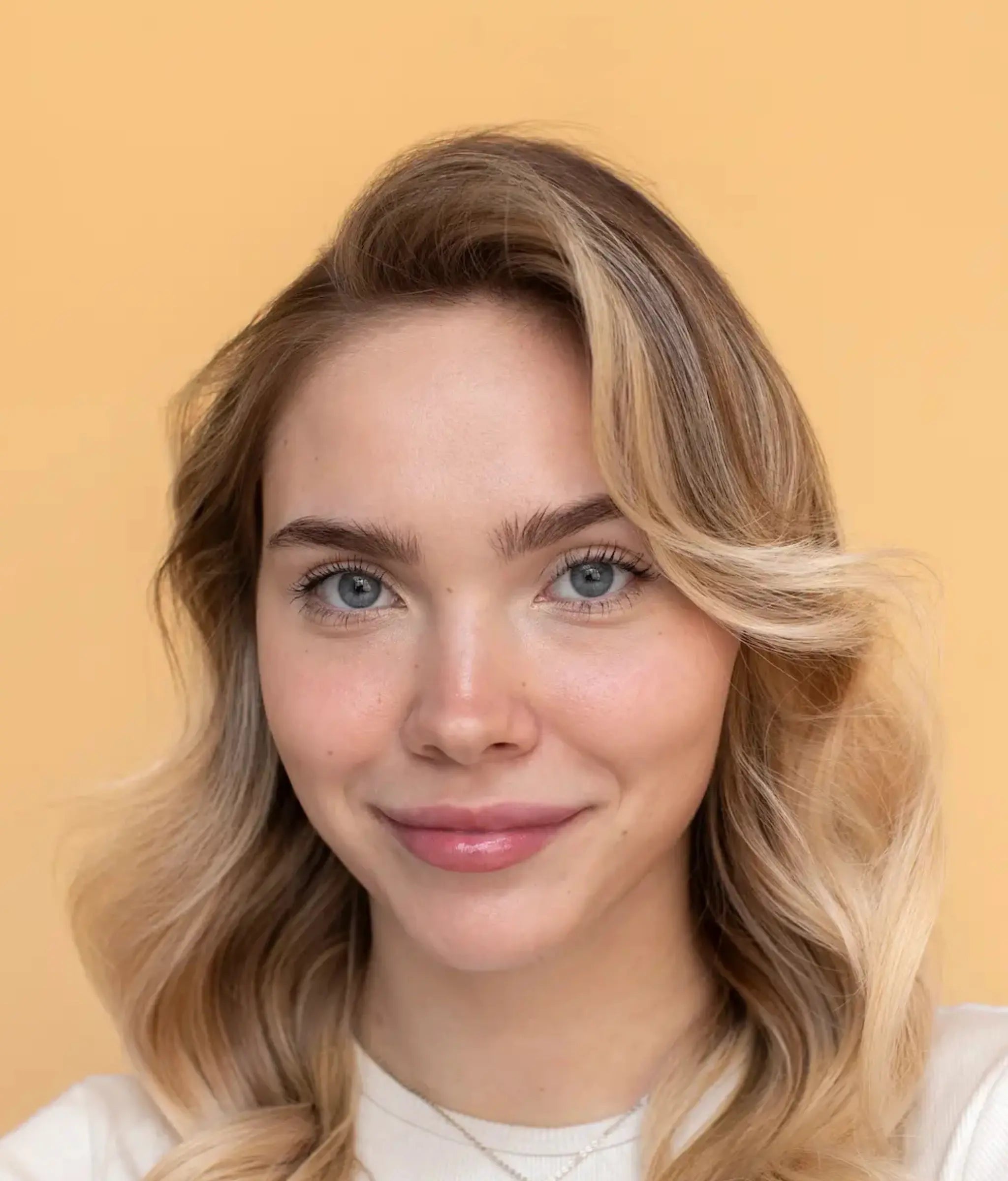 Happy customer after using Exosthetics microneedling serum